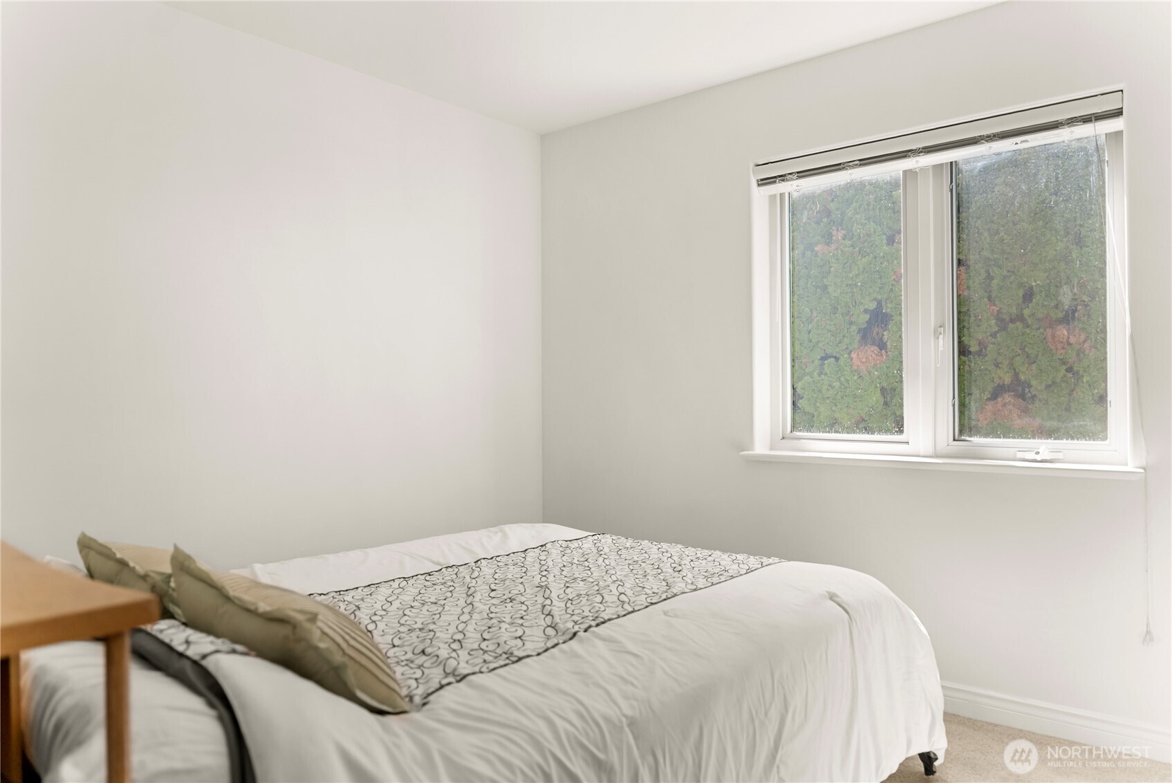 428 Eastlake Road Oroville, WA 98844 - Photo 21 of 34 a bedroom with a bed and a window