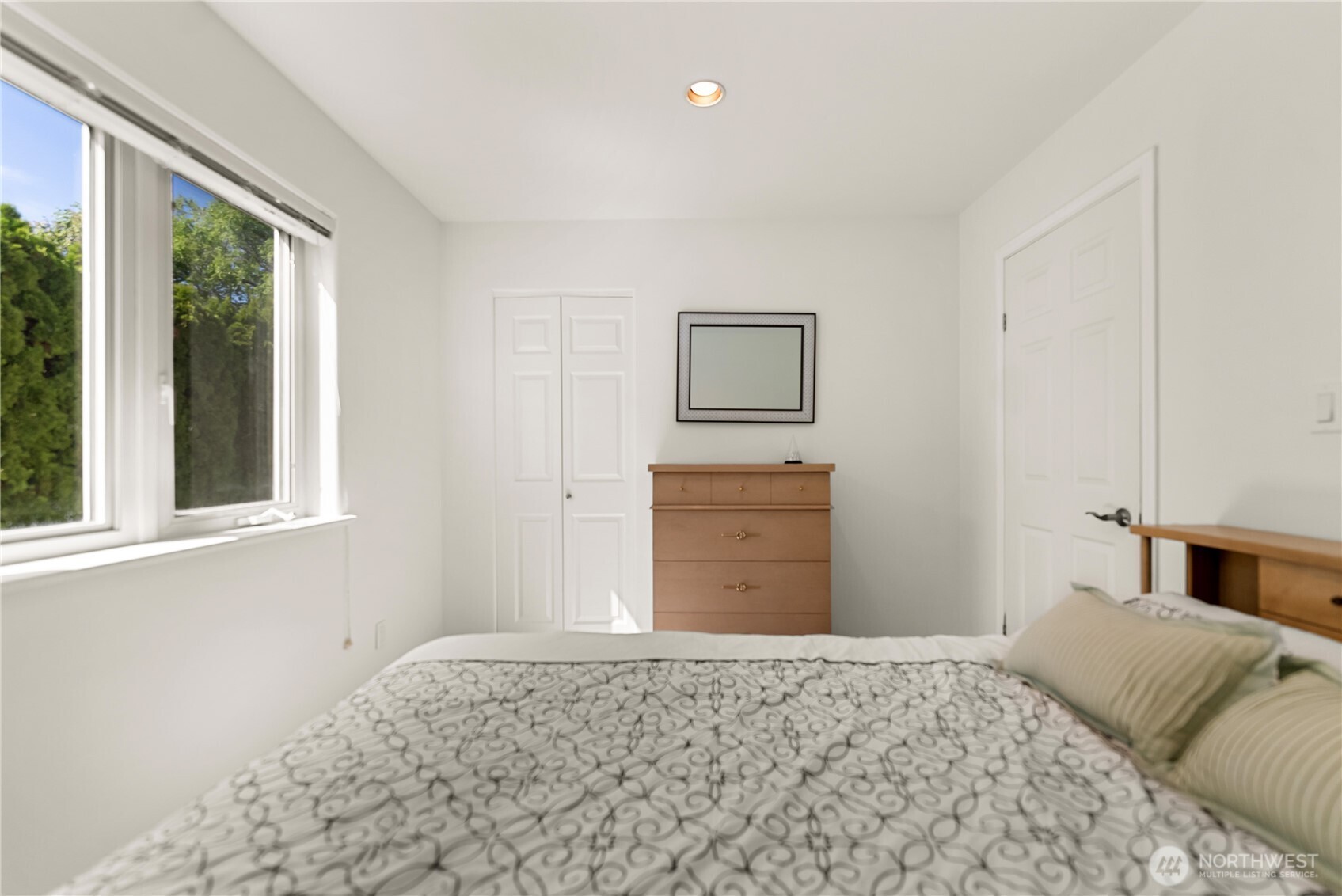 428 Eastlake Road Oroville, WA 98844 - Photo 22 of 34 a bedroom with a bed and a window