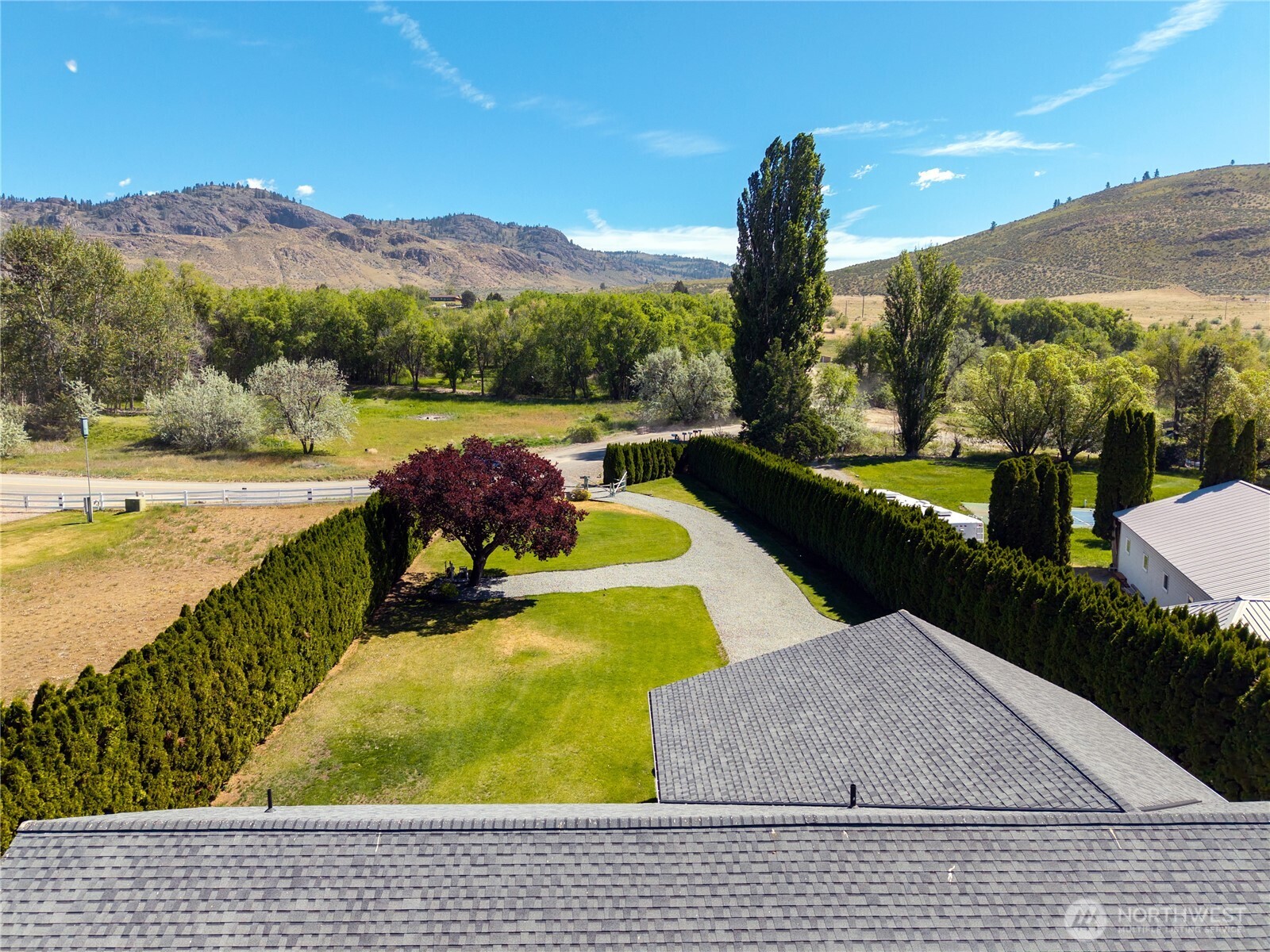 428 Eastlake Road Oroville, WA 98844 - Photo 30 of 34 a view of a swimming pool with an ocean view