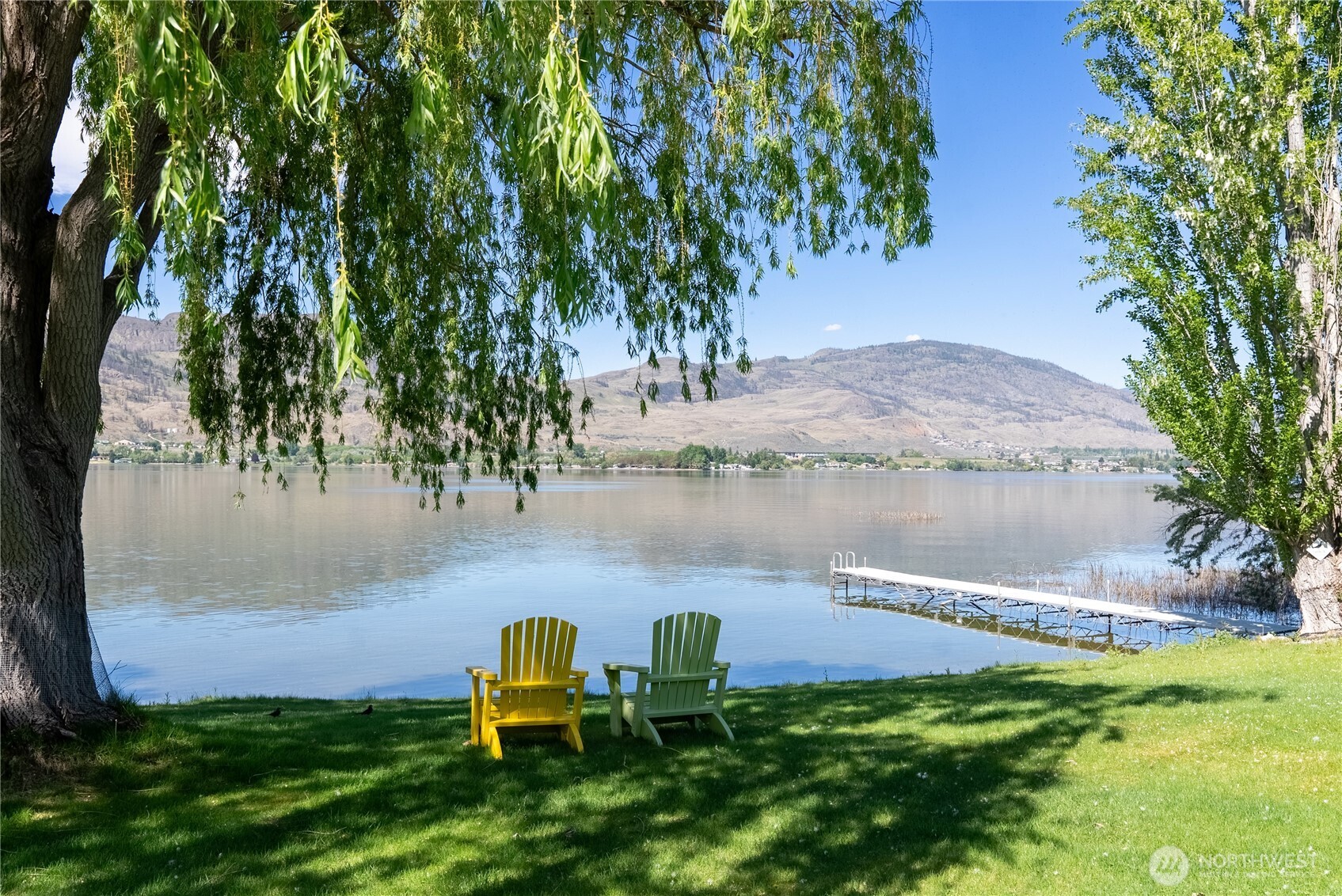428 Eastlake Road Oroville, WA 98844 - Photo 32 of 34 a lake view with a garden