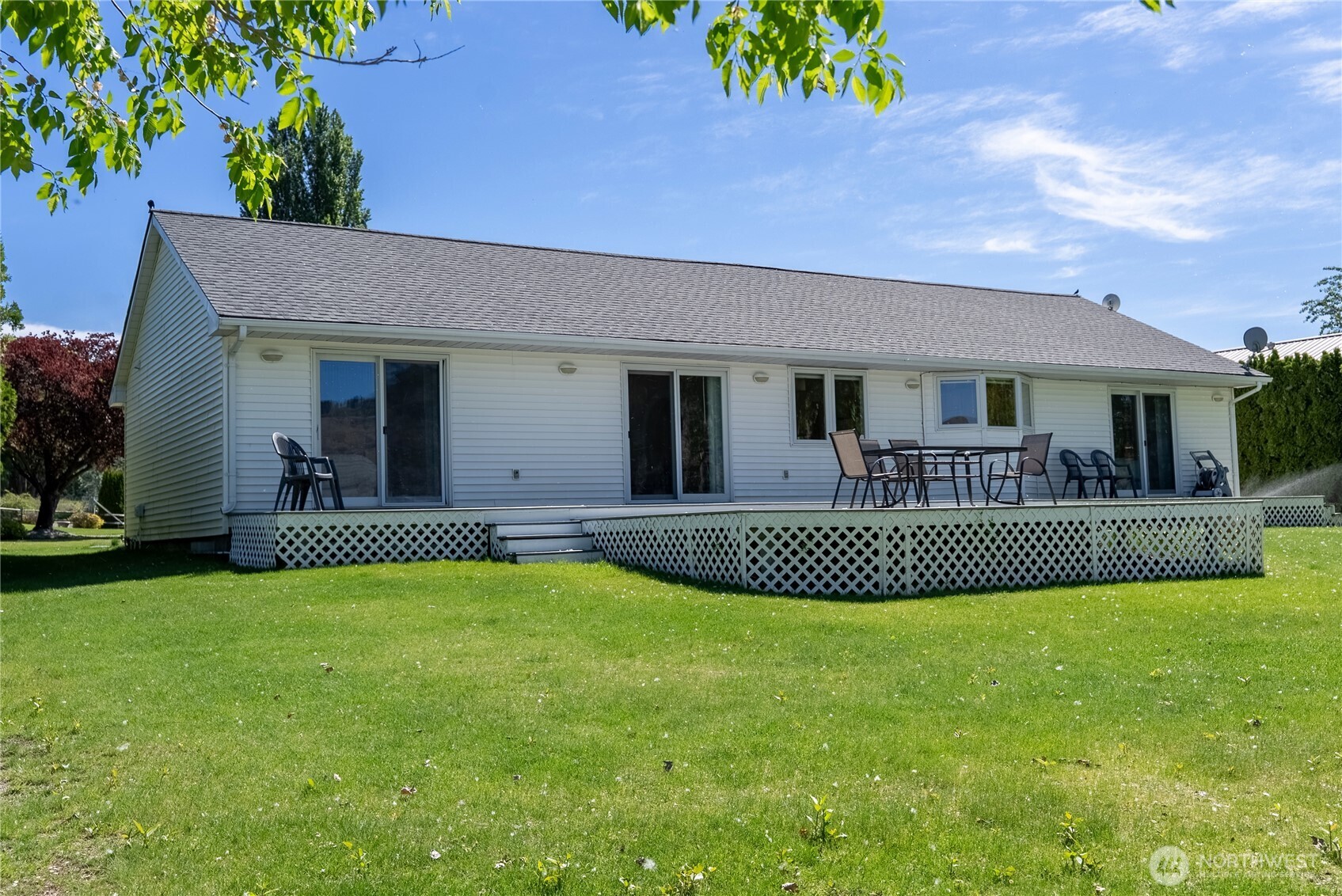 428 Eastlake Road Oroville, WA 98844 - Photo 33 of 34 a view of house with a yard