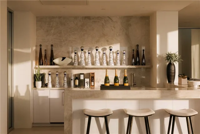 a kitchen with a table and chairs in it