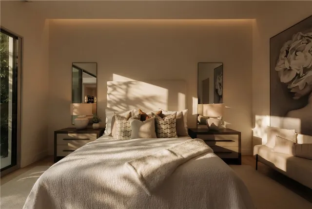 a bedroom with a bed and a couch