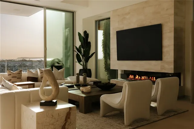 a view of a living room and a flat screen tv