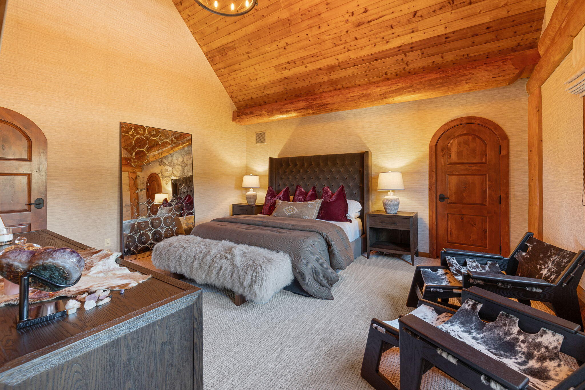 61380 Devils Ladder Road Mountain Center, CA 92561 - Photo 11 of 44 a bedroom with bed a mirror and a potted plant