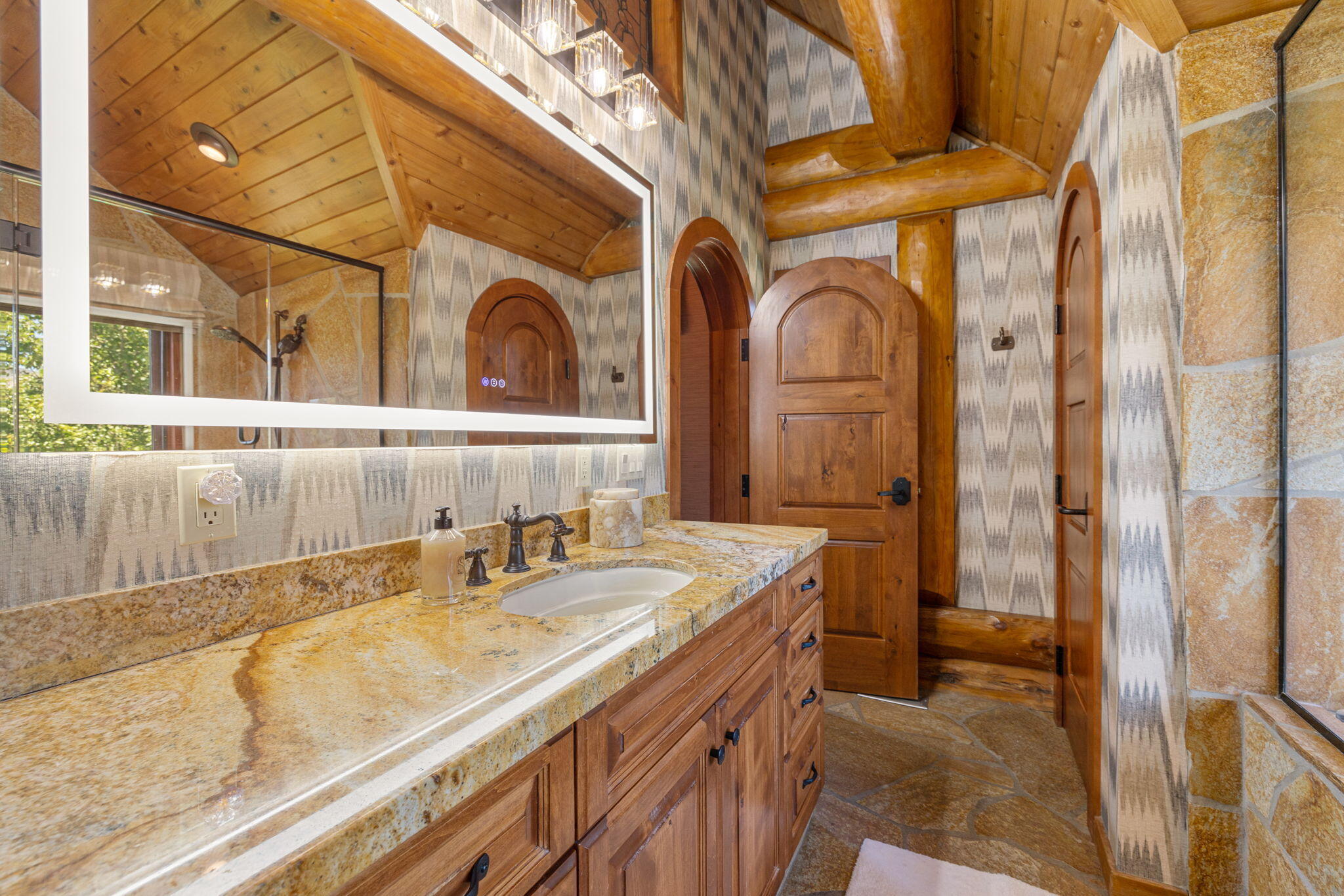 61380 Devils Ladder Road Mountain Center, CA 92561 - Photo 14 of 44 a bathroom with a sink and a mirror