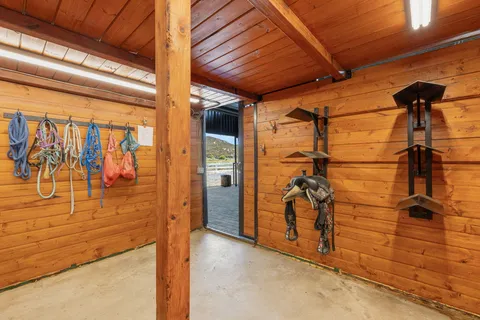 a view of a porch with wooden floor