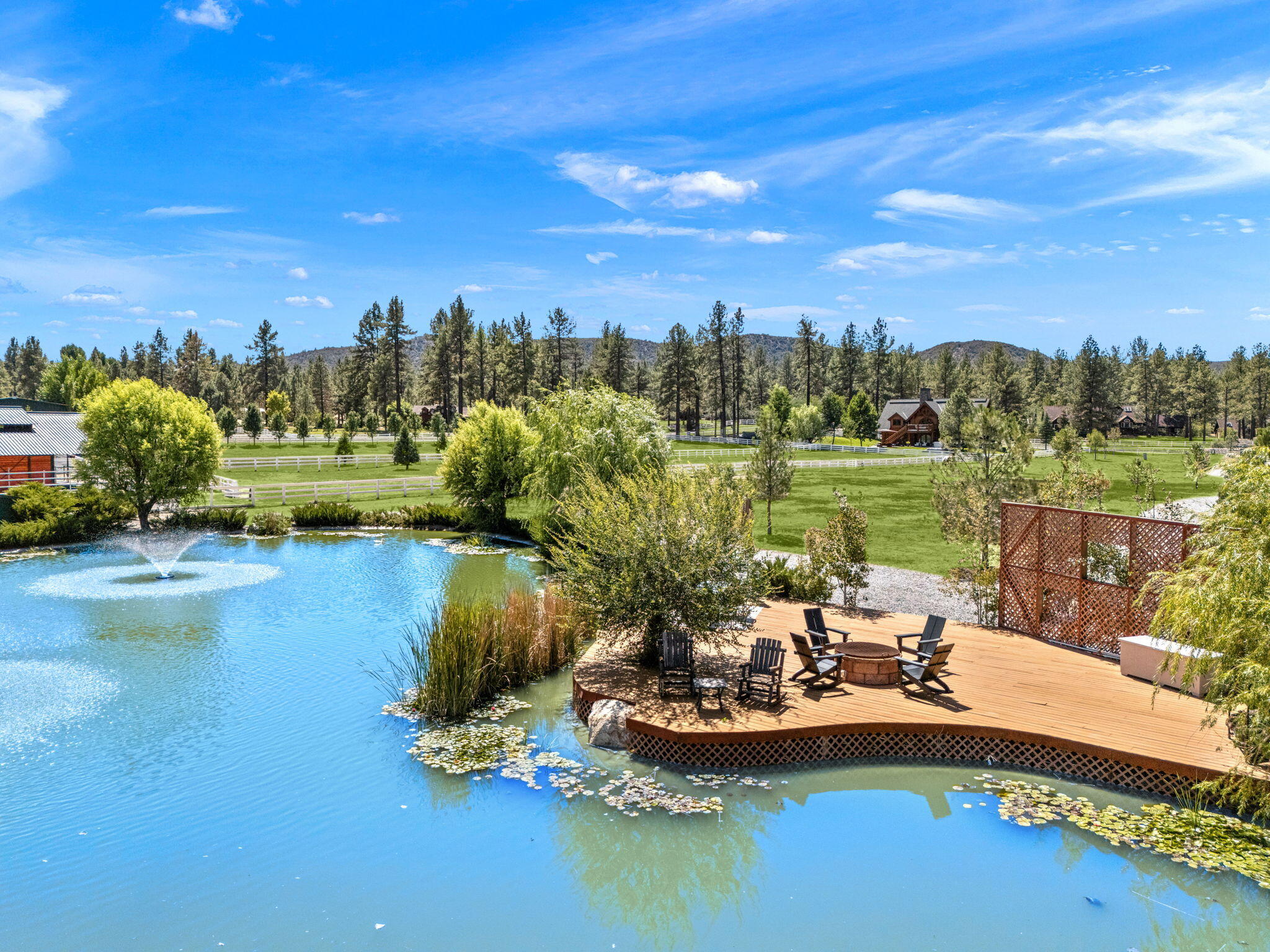 61380 Devils Ladder Road Mountain Center, CA 92561 - Photo 37 of 44 a view of a lake with a yard