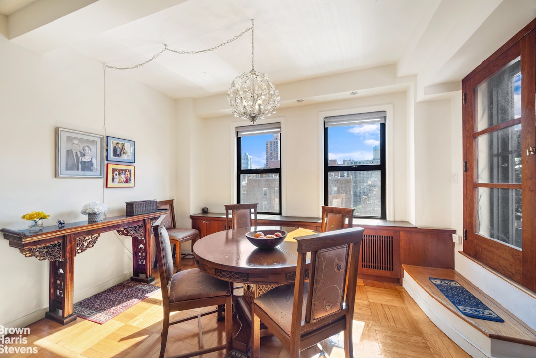123 East 37th Street, Unit 14C Manhattan, NY 10016 - Photo 4 of 14 a view of a dining room with furniture window and wooden floor