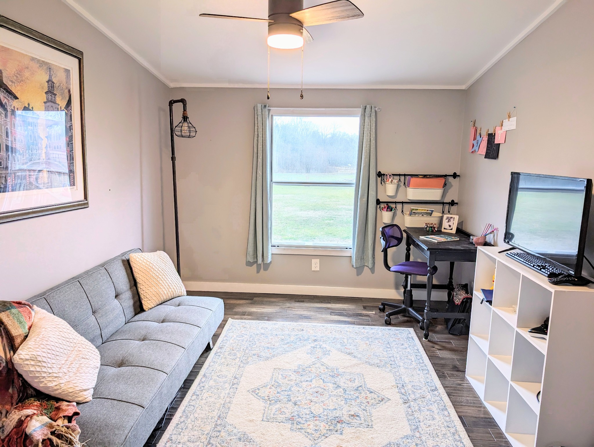 482 Fruit Valley Road Rockvale, TN 37153 - Photo 21 of 37 a living room with furniture and a flat screen tv