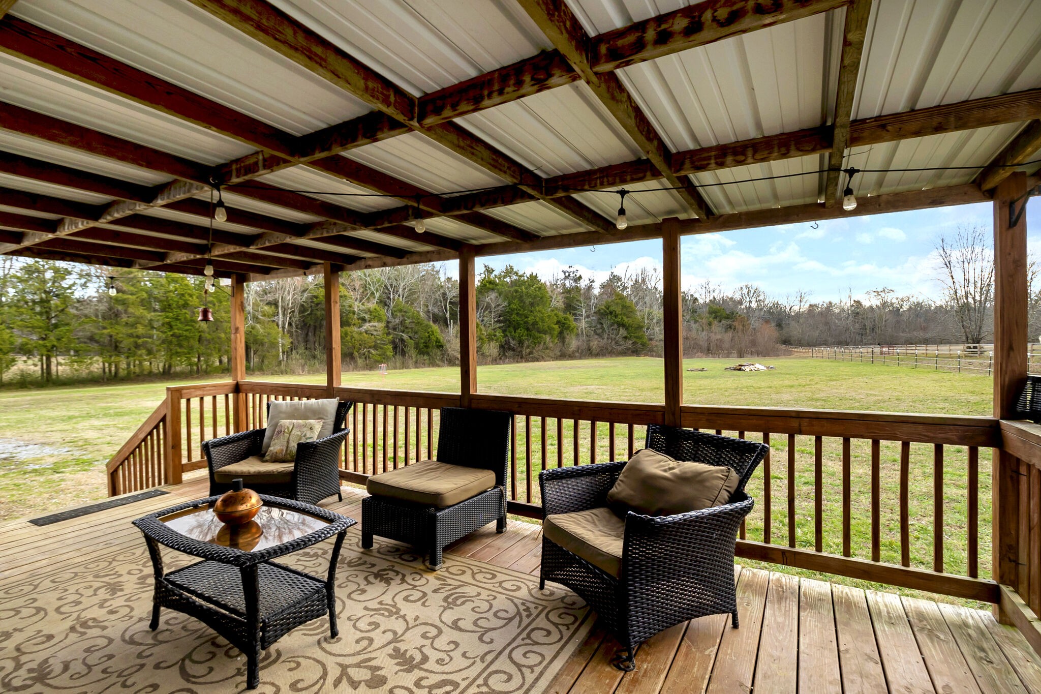 482 Fruit Valley Road Rockvale, TN 37153 - Photo 29 of 37 a balcony with furniture and wooden floor