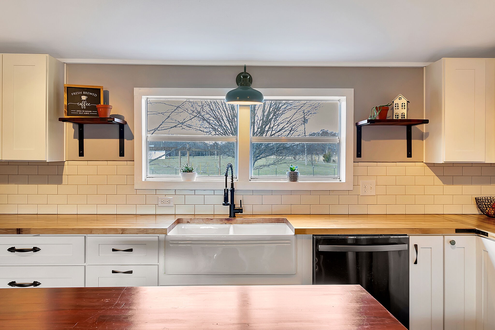 482 Fruit Valley Road Rockvale, TN 37153 - Photo 9 of 37 a kitchen with a stove a sink and a window