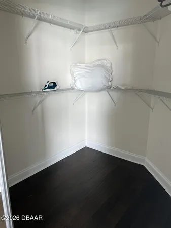 a view of a room with racks on the wall