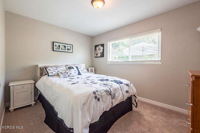 894 Appleton Road Simi Valley, CA 93065 - Photo 14 of 32 a bedroom with a bed and a window
