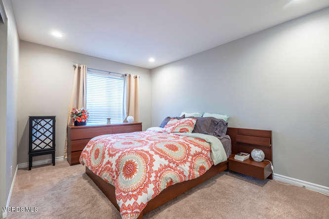 894 Appleton Road Simi Valley, CA 93065 - Photo 22 of 32 a bedroom with a bed and a window