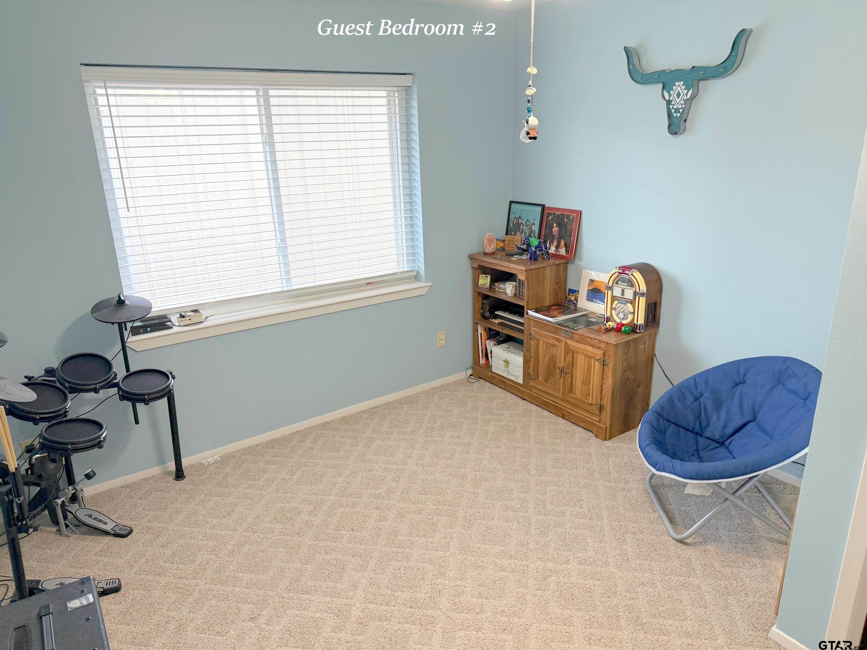 237 Oregon Street Van, TX 75790 - Photo 18 of 44 a bedroom with furniture and a window