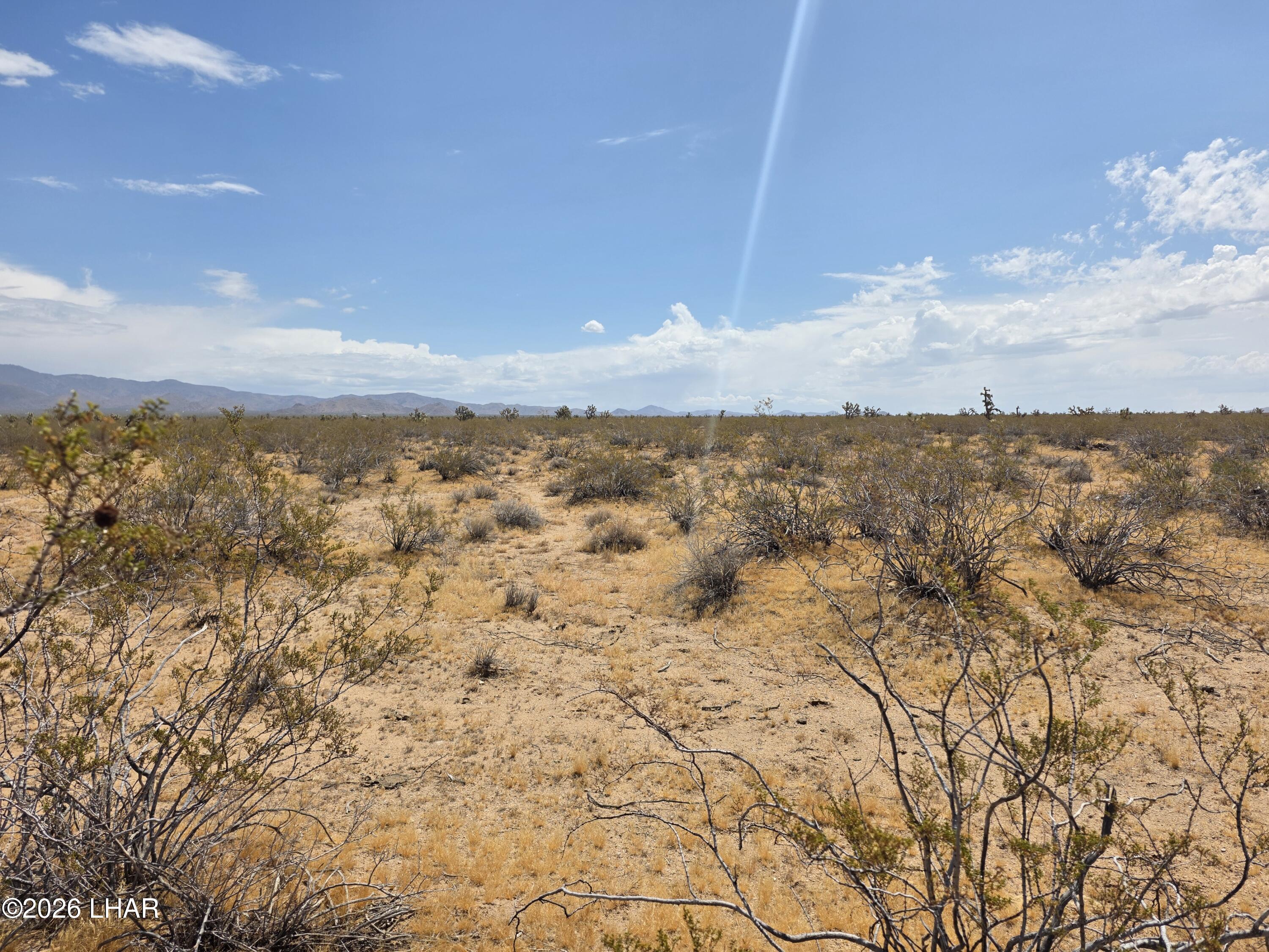 Parcel2328 South Tom Mix Road Yucca, AZ 86438 - Photo 12 of 17 a view of city and mountain
