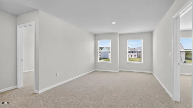 an empty room with windows