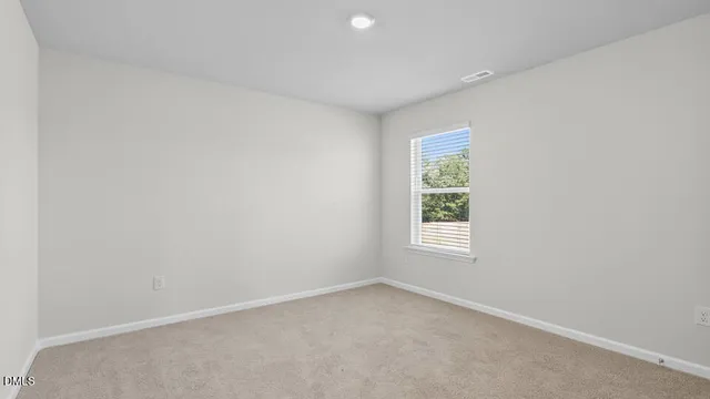 an empty room with window