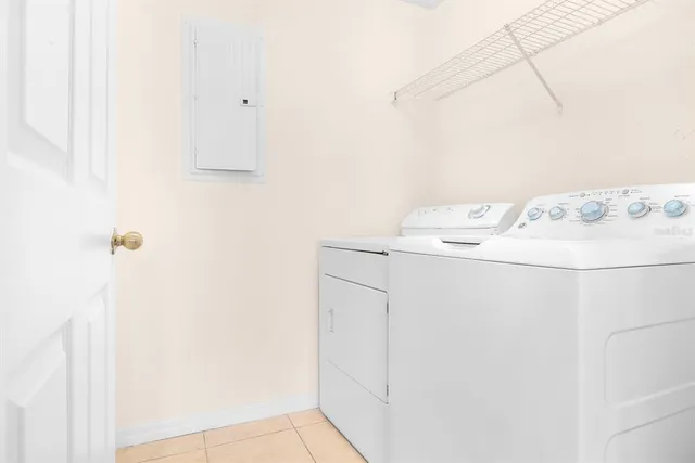 a utility room with dryer and washer