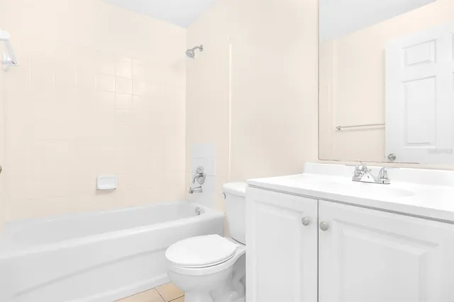 a bathroom with a sink a toilet and a bathtub