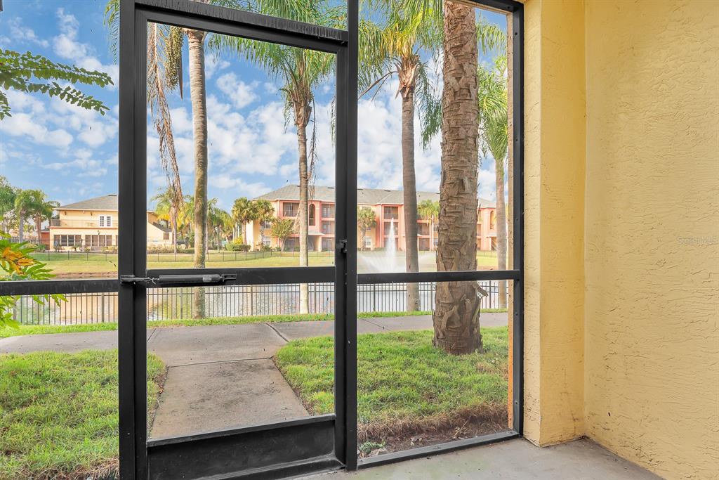 10873 Windsor Walk Drive, Unit 4106 Orlando, FL 32837 - Photo 21 of 30 a view of a room with a large window