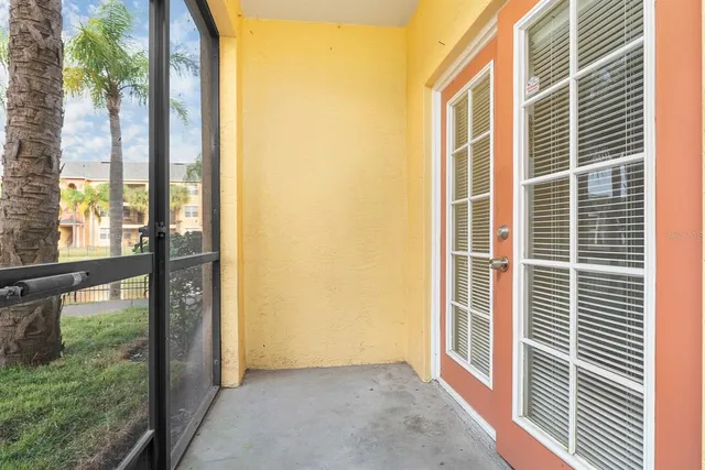 a view of a porch with a door