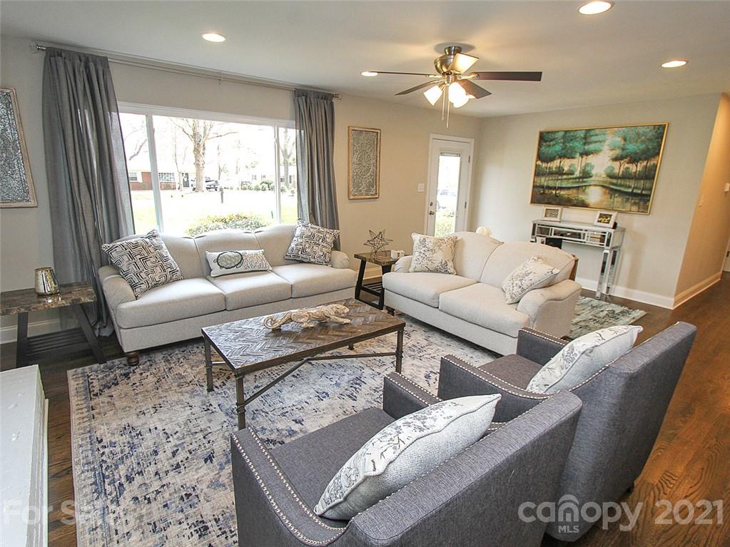 405 Fieldstone Road Mooresville, NC 28115 - Photo 13 of 46 a living room with furniture and a large window