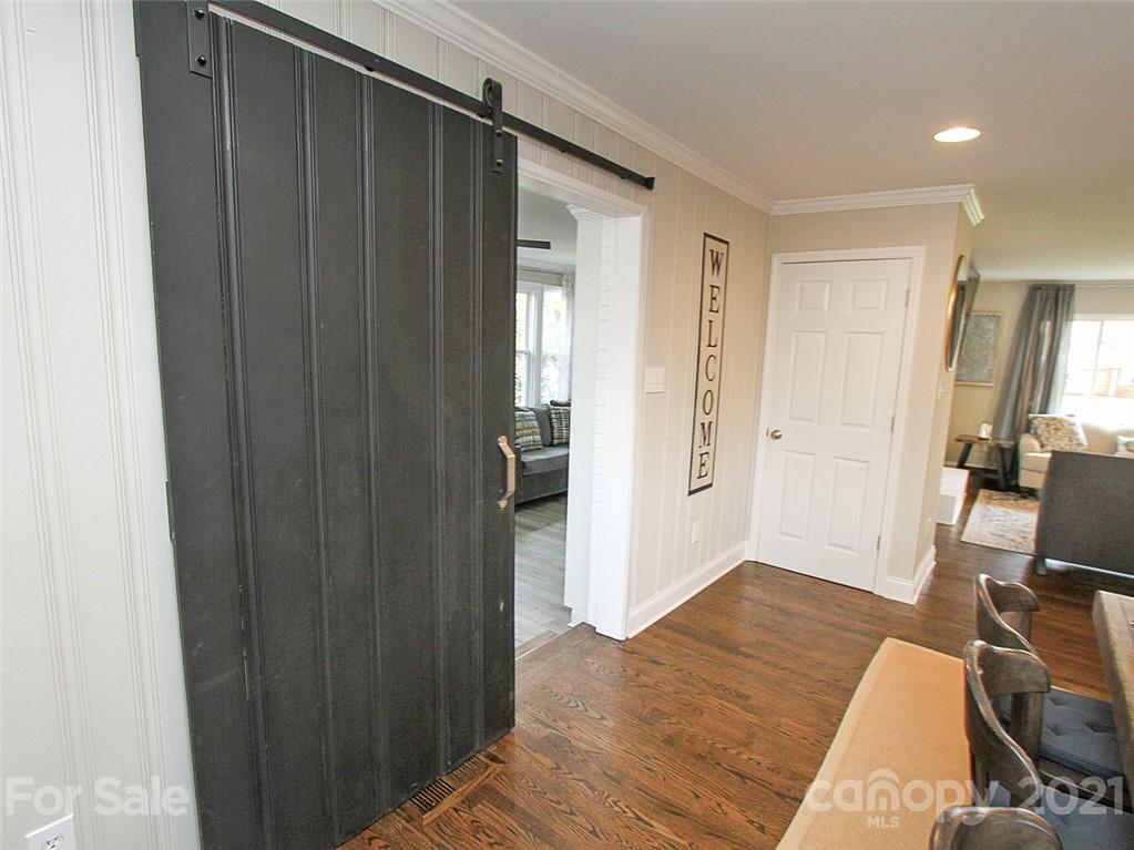 405 Fieldstone Road Mooresville, NC 28115 - Photo 20 of 46 a bedroom with a bed and a mirror