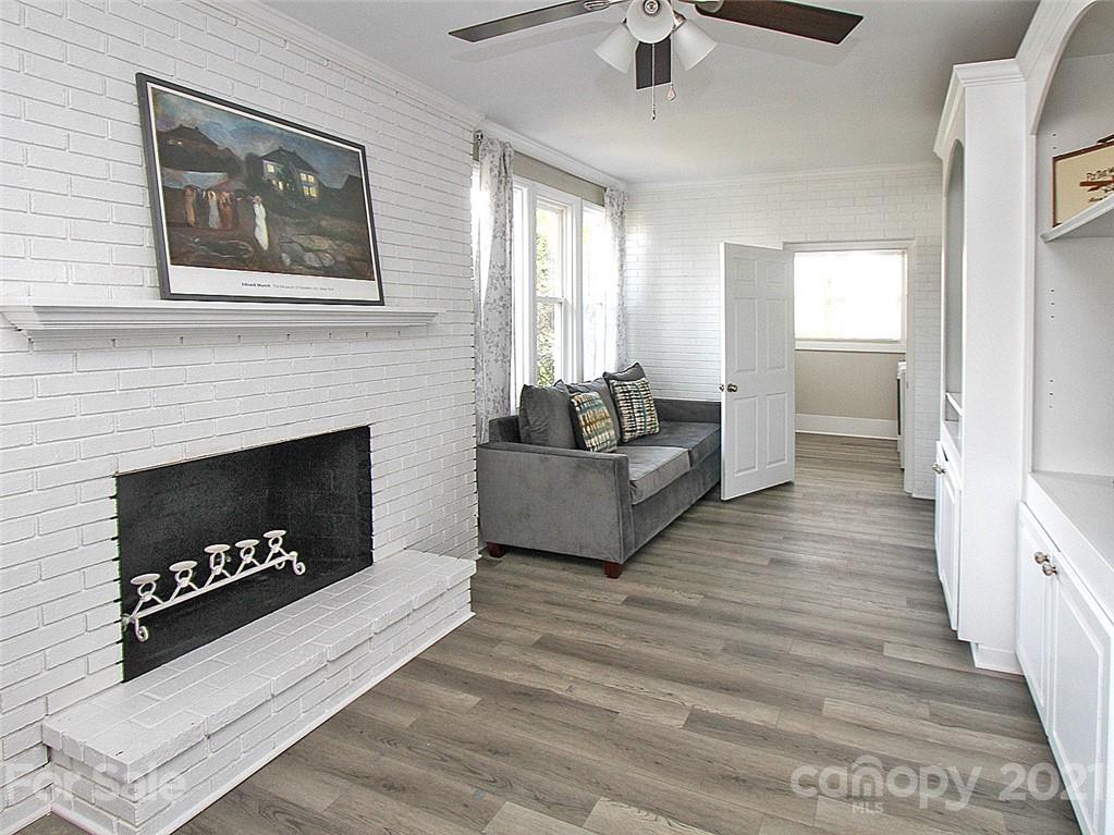 405 Fieldstone Road Mooresville, NC 28115 - Photo 21 of 46 a living room with furniture and a fireplace