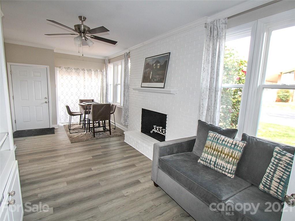 405 Fieldstone Road Mooresville, NC 28115 - Photo 26 of 46 a living room with furniture and a fireplace