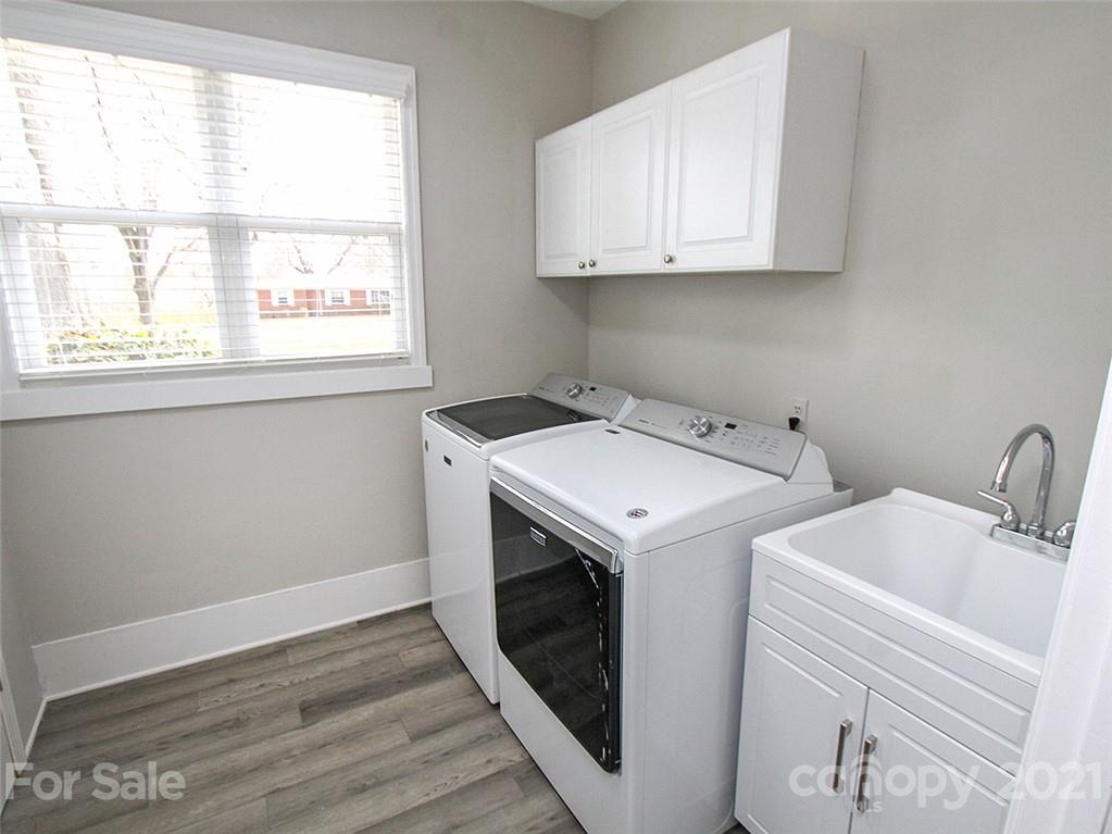 405 Fieldstone Road Mooresville, NC 28115 - Photo 36 of 46 a utility room with sink dryer and washer