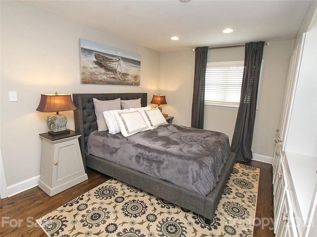 405 Fieldstone Road Mooresville, NC 28115 - Photo 37 of 46 a bed sitting in a room next to a window