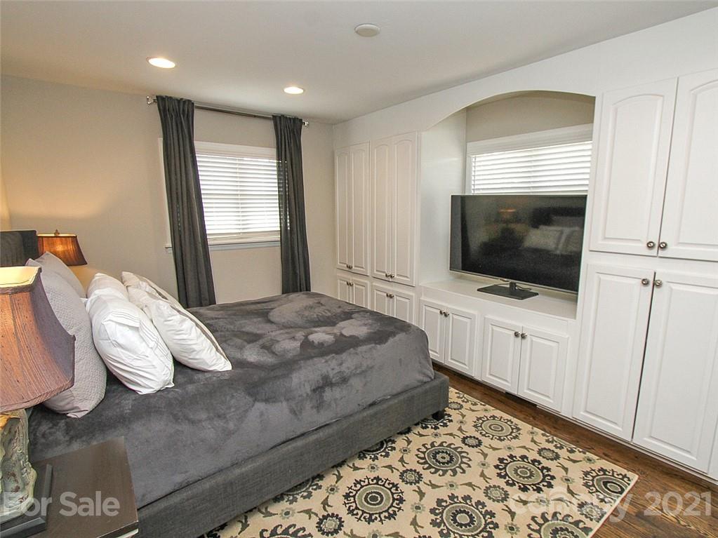 405 Fieldstone Road Mooresville, NC 28115 - Photo 39 of 46 a bedroom with a bed and a flat screen tv