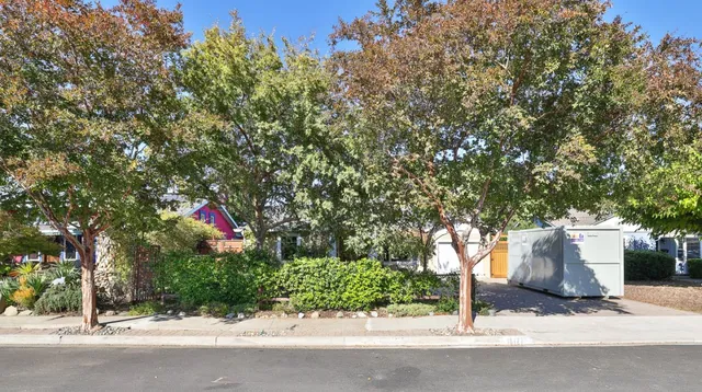 a outdoor living space with patio furniture and a garden