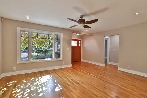a view of an empty room and window