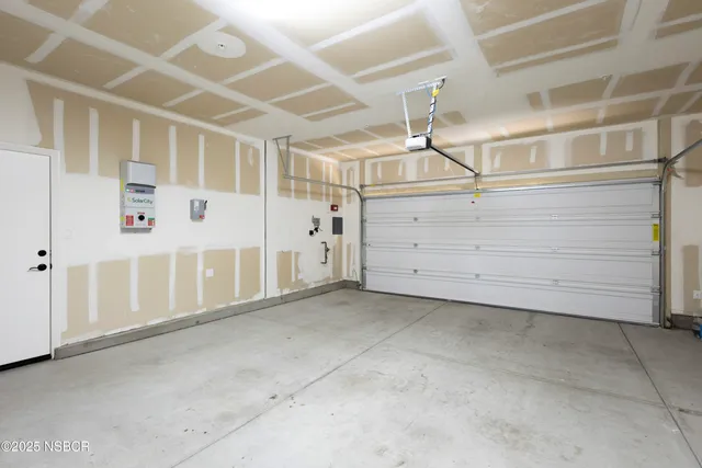 a view of a room with white walls