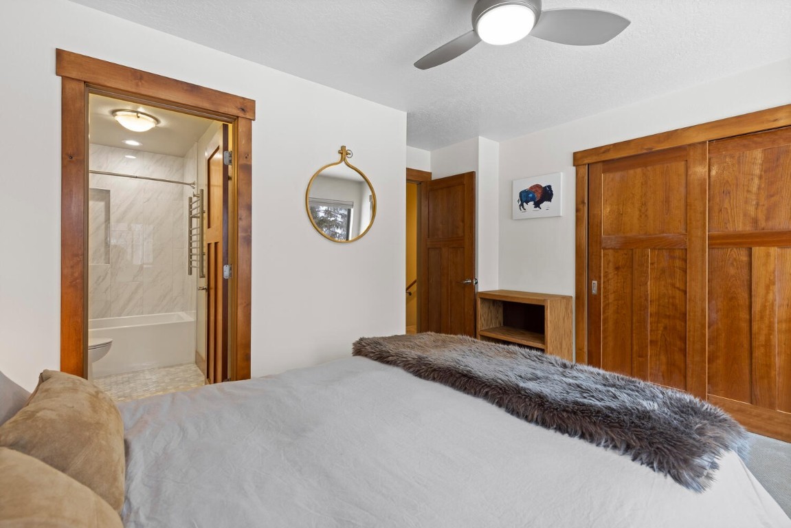 1928 Soda Ridge Road, Unit 1226 Keystone, CO 80435 - Photo 23 of 34 a bedroom with a bed and a window