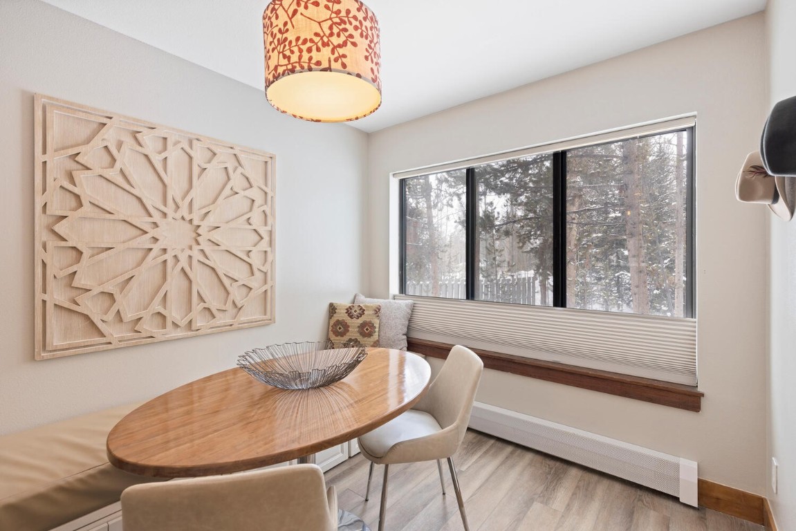 1928 Soda Ridge Road, Unit 1226 Keystone, CO 80435 - Photo 8 of 34 a dining room with furniture and window
