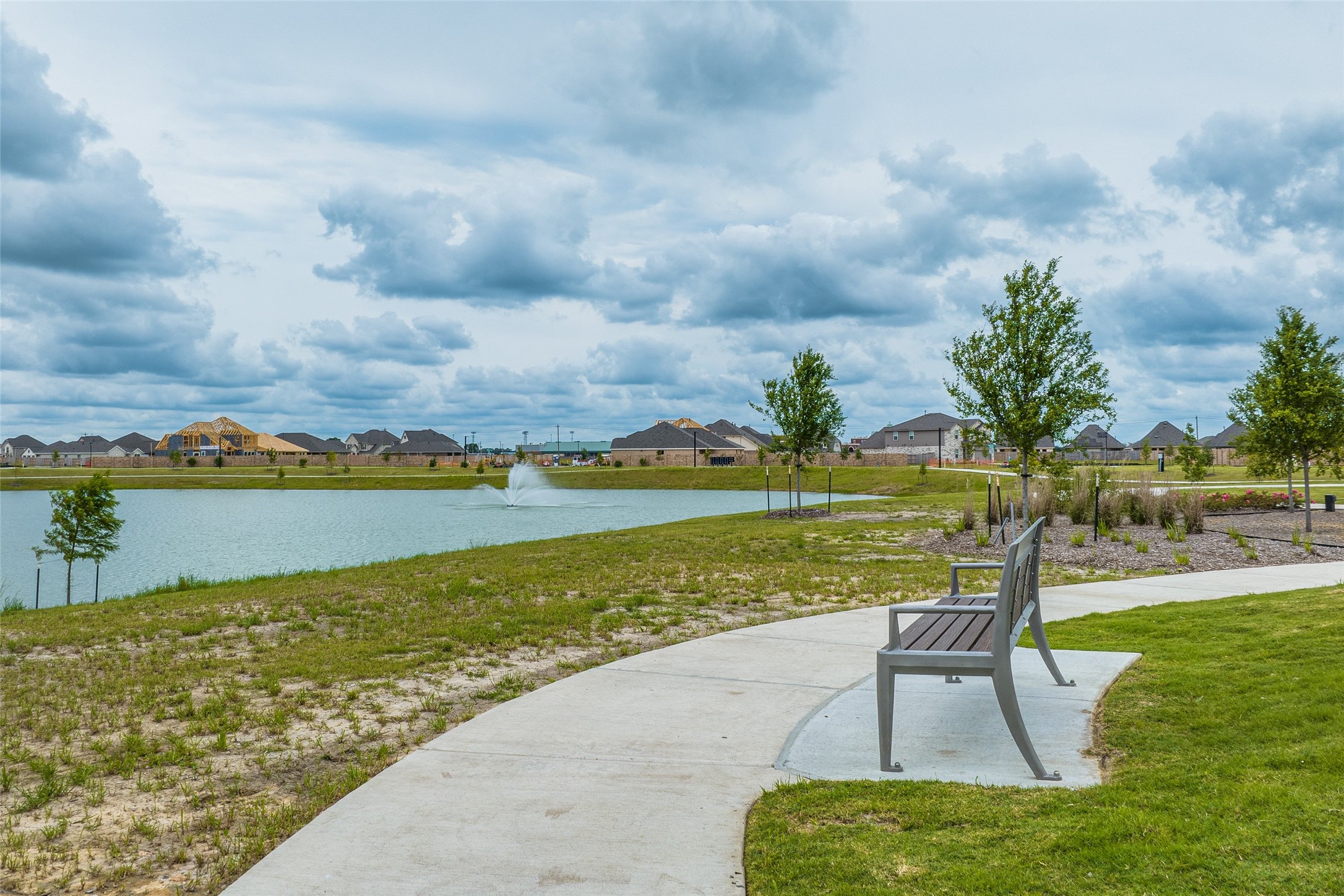 1911 Stargazer Lane Angleton, TX 77515 - Photo 33 of 33 a view of a lake with a big yard