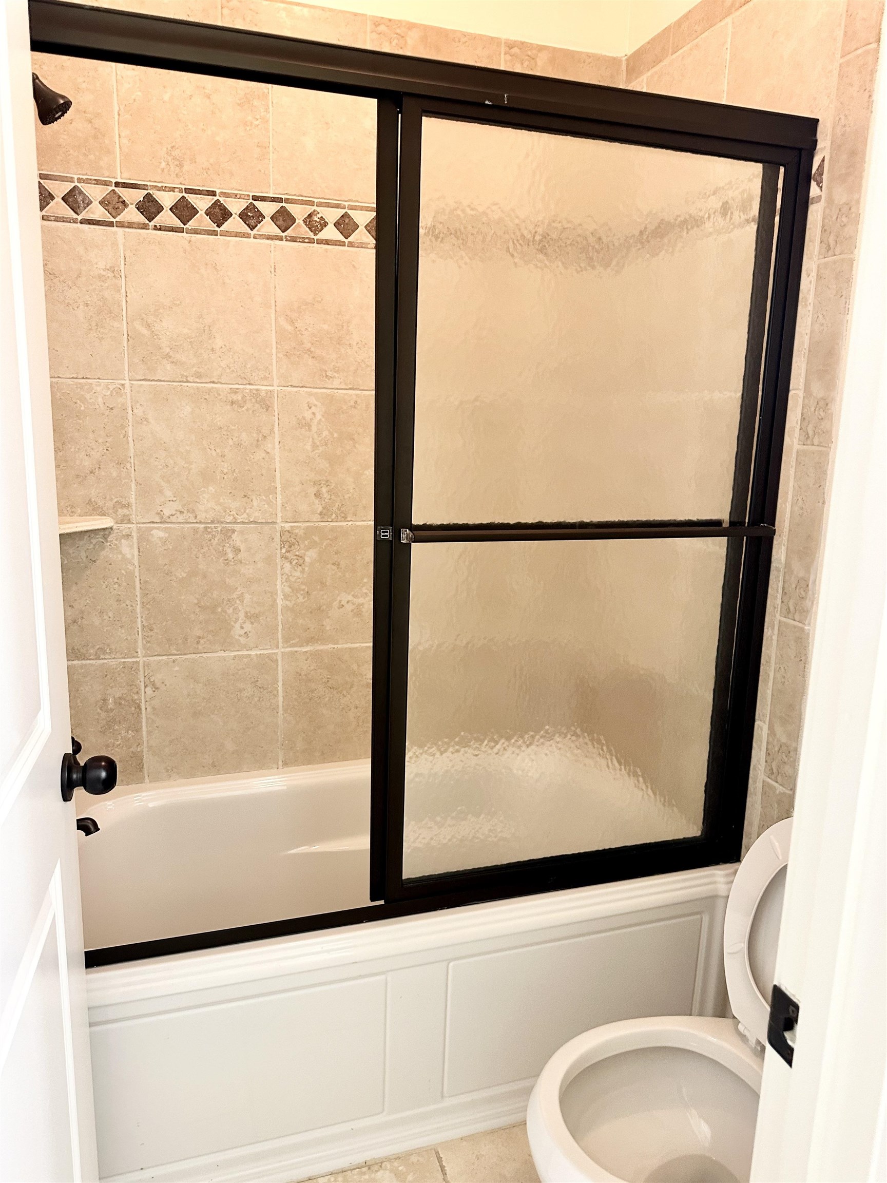 205 Jamerson Farm Road Collierville, TN 38017 - Photo 17 of 36 a bathroom with a bathtub and a shower