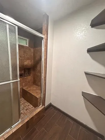 a view of elevator with wooden floor