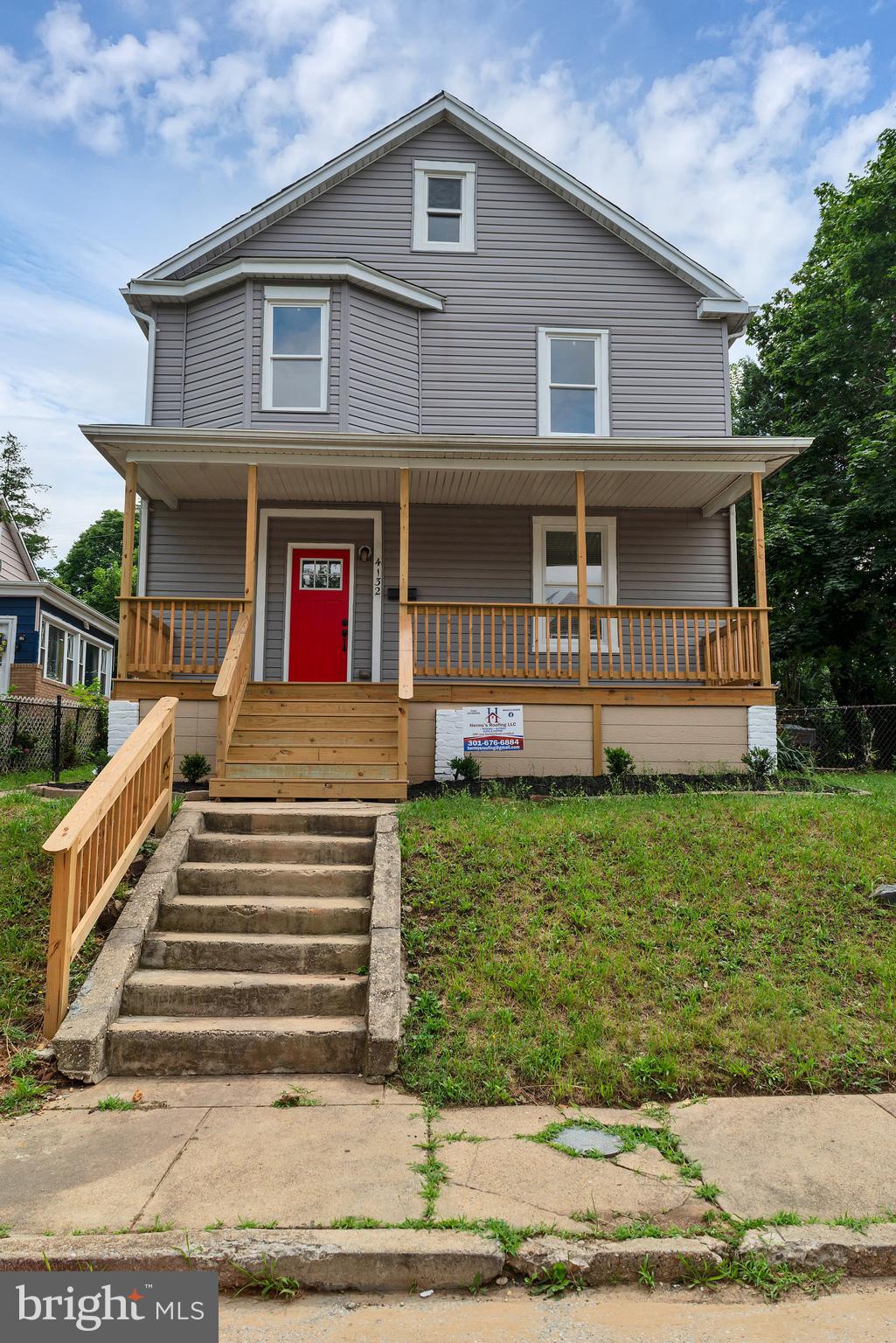 4132 Marx Avenue Baltimore, MD 21206 - Photo 1 of 76 a front view of a house with a yard