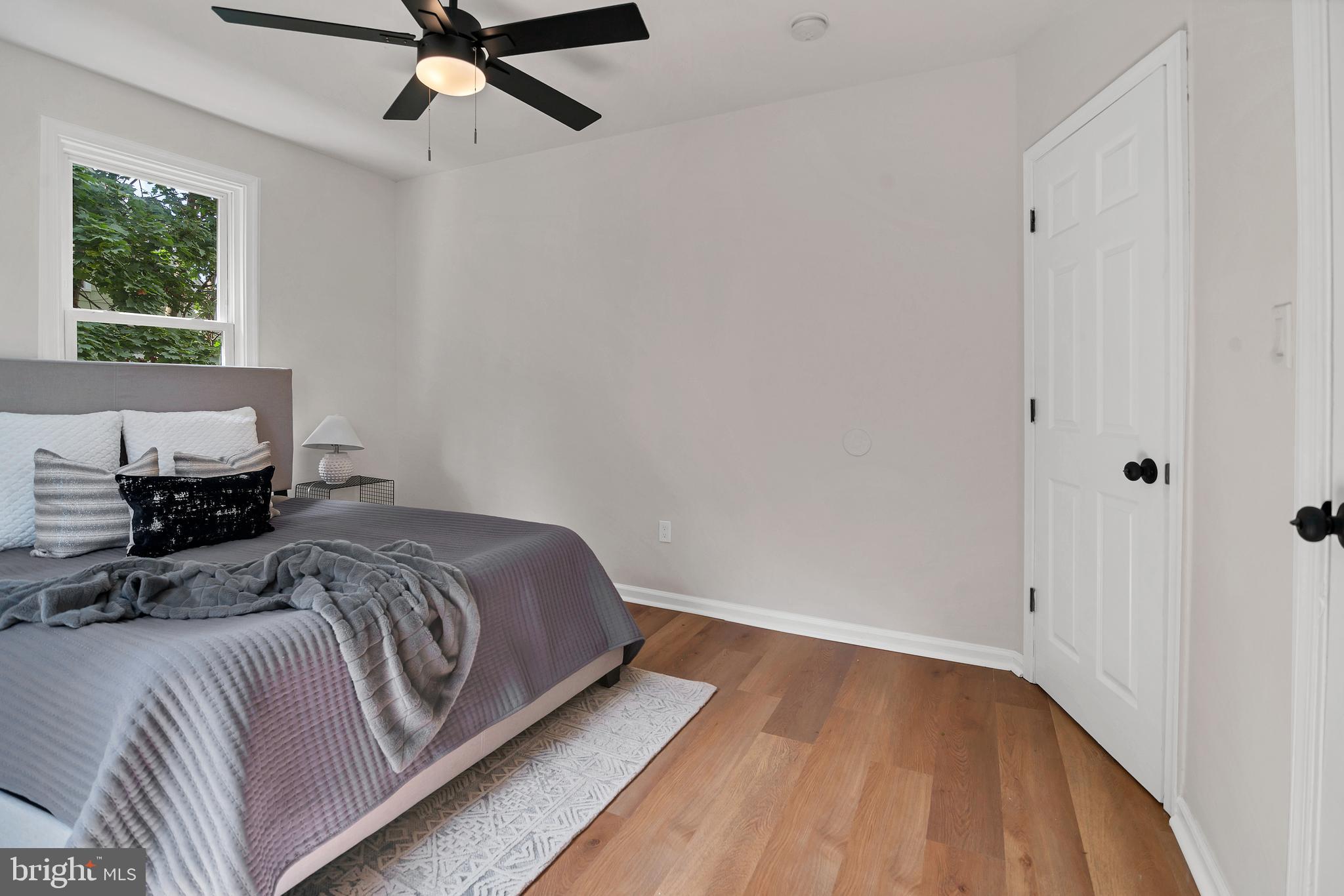 4132 Marx Avenue Baltimore, MD 21206 - Photo 30 of 76 a bedroom with a bed and window