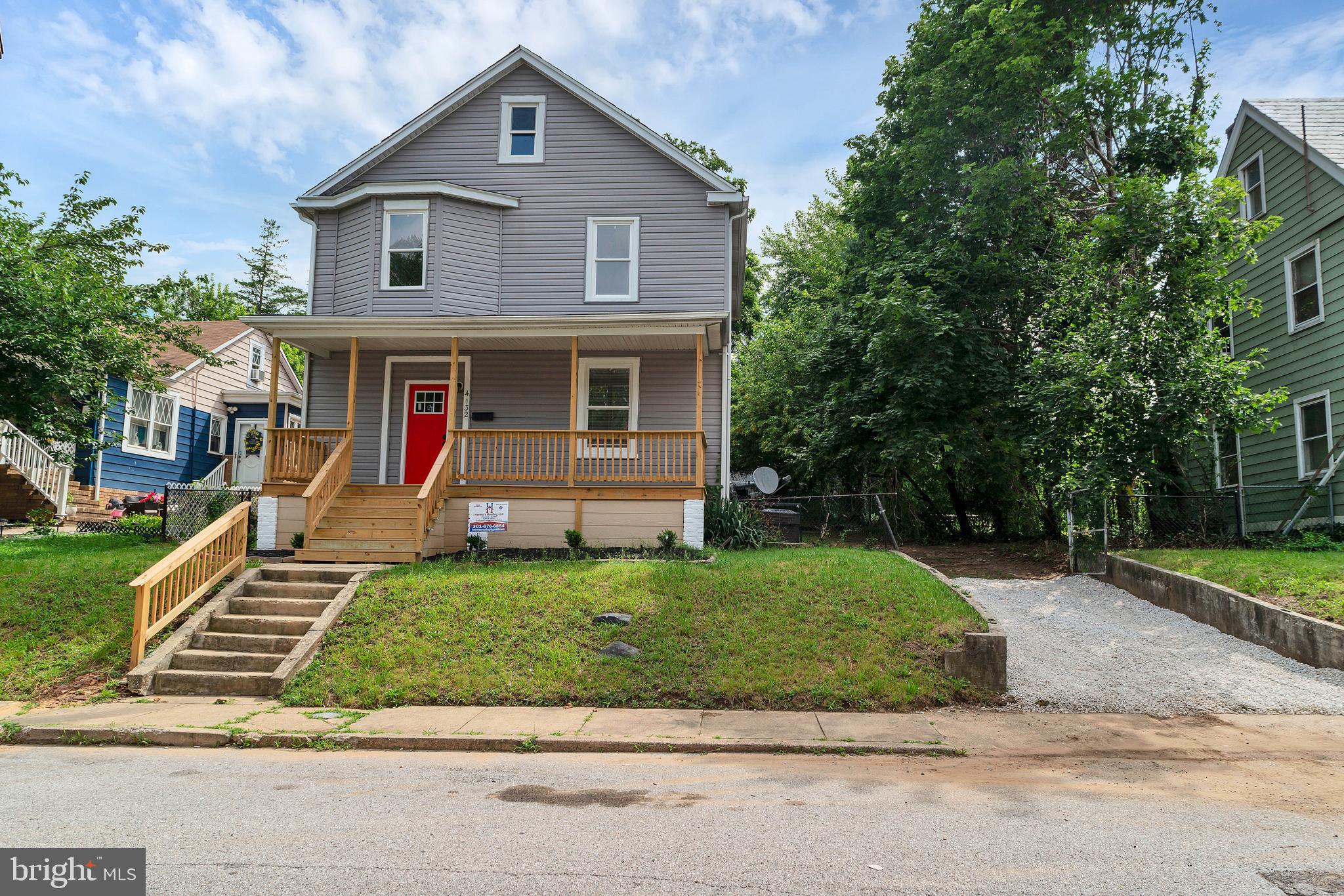 4132 Marx Avenue Baltimore, MD 21206 - Photo 3 of 76 a front view of a house with a yard