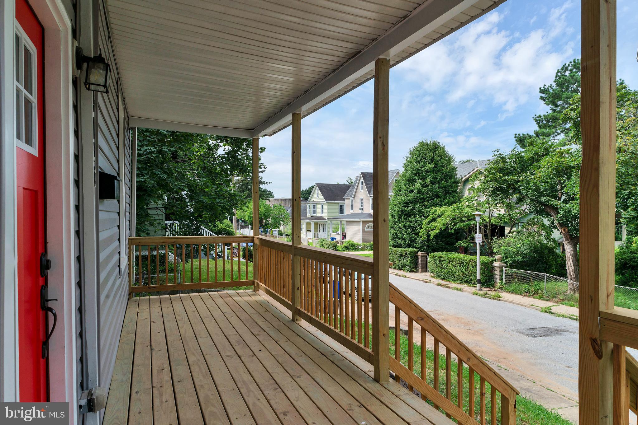 4132 Marx Avenue Baltimore, MD 21206 - Photo 7 of 76 a view of a balcony with wooden floor