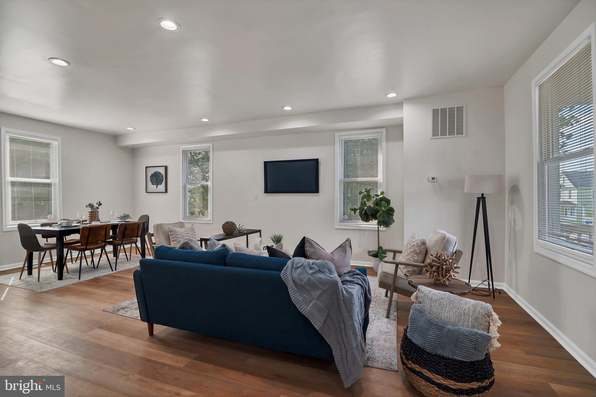4132 Marx Avenue Baltimore, MD 21206 - Photo 9 of 76 a living room with furniture a wooden floor and a window