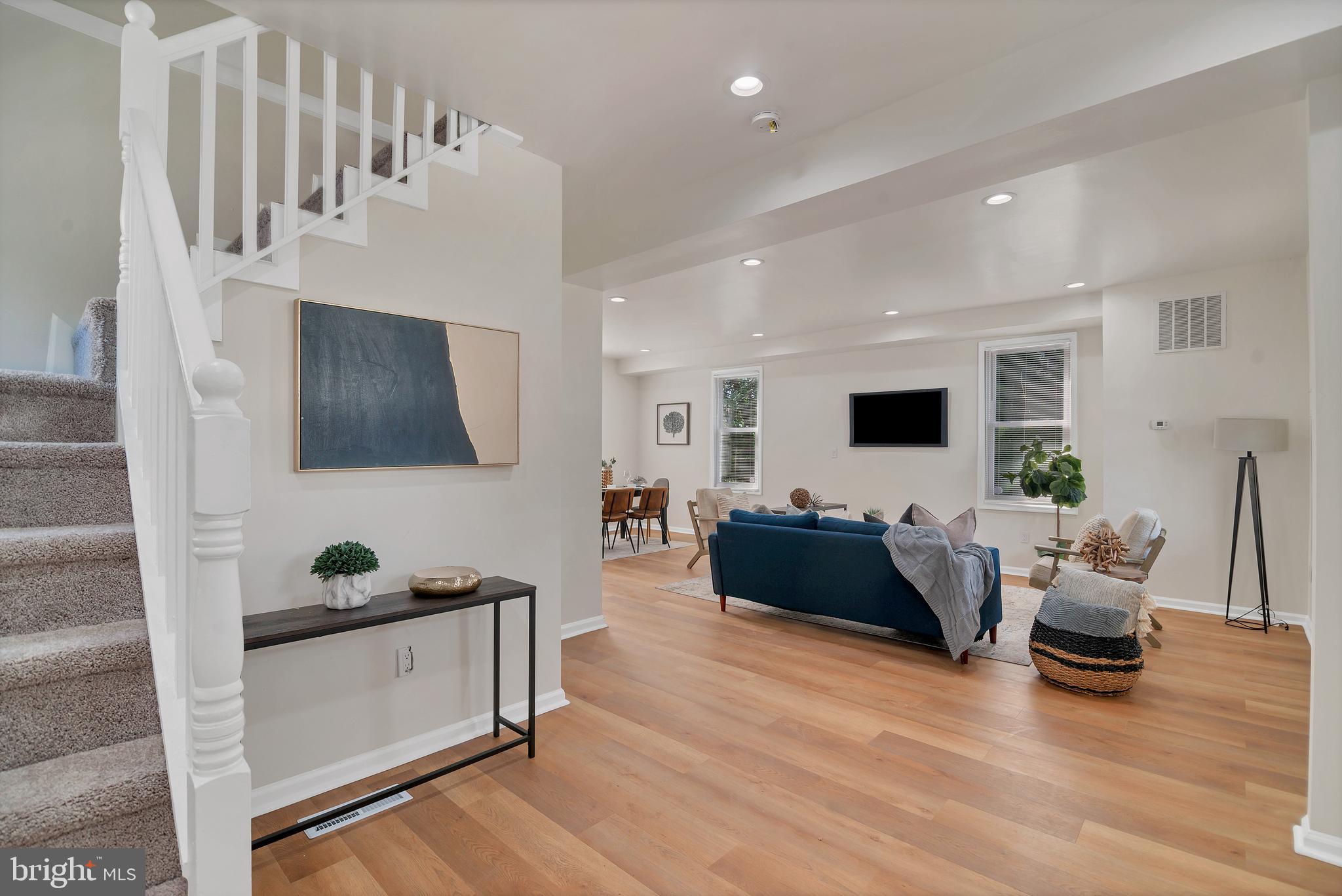 4132 Marx Avenue Baltimore, MD 21206 - Photo 10 of 76 a living room with furniture and a flat screen tv