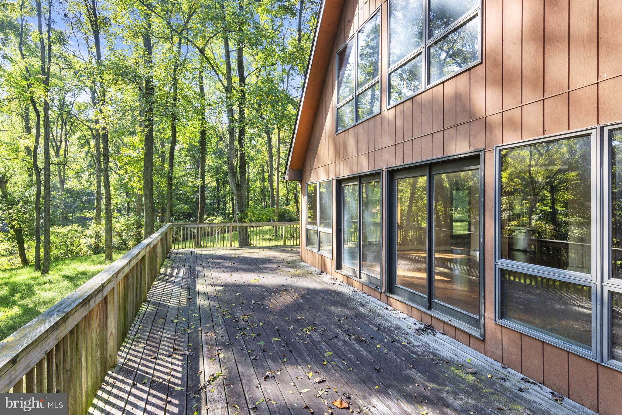 570 Chandler Mill Road Avondale, PA 19311 - Photo 4 of 41 a view of balcony with wooden floor and fence