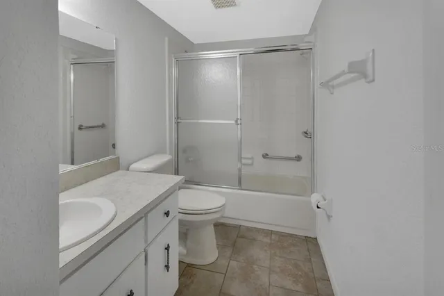 a view of a balcony with wooden floor